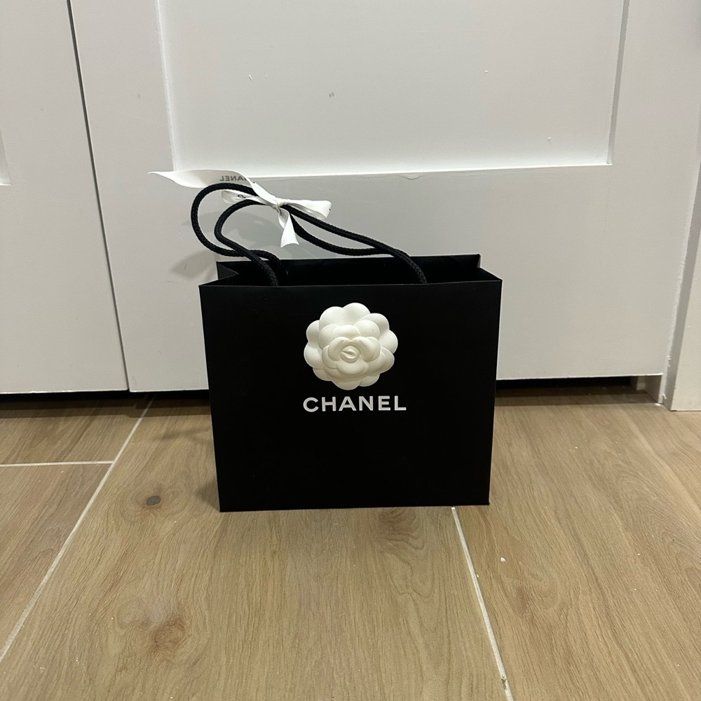 CHANEL Small Black Bag with White Flower + Ribbon